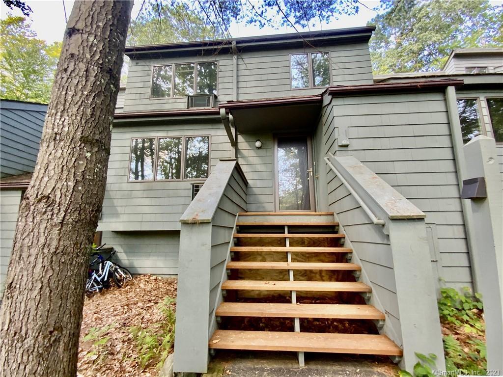 front view of a house with a balcony