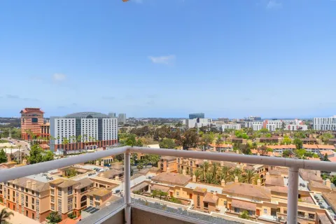 a view of a balcony with city