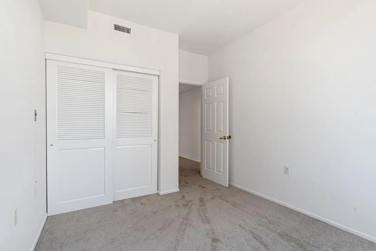 3890 Nobel Drive, Unit 1203 San Diego, CA 92122 - Photo 13 of 22 a view of an empty room