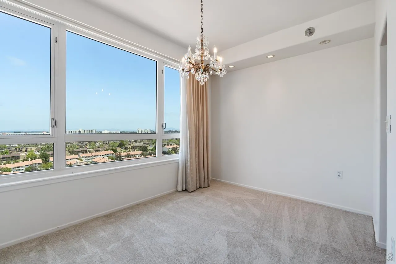 3890 Nobel Drive, Unit 1203 San Diego, CA 92122 - Photo 7 of 22 a view of a kitchen with a sink and a window