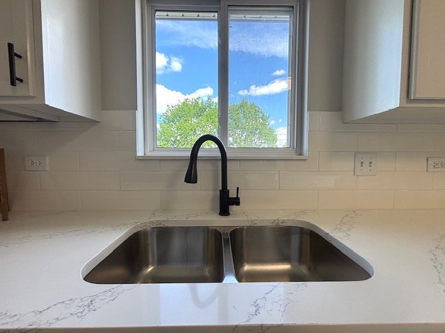 508 Ramsden Road Plano, IL 60545 - Photo 10 of 20 a kitchen with a sink and a window