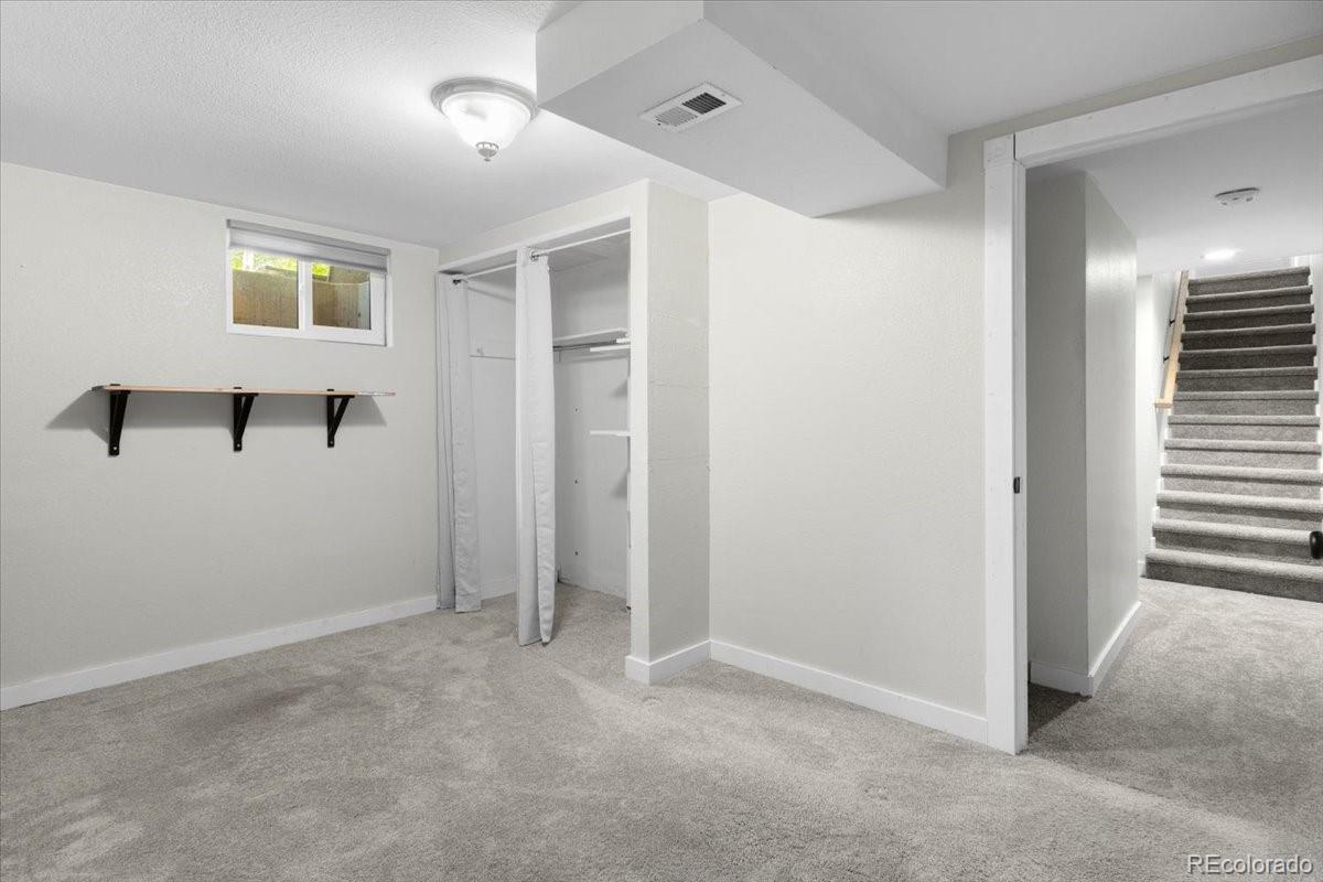 6314 Brooks Drive Arvada, CO 80004 - Photo 24 of 50 a view of a hallway with closet area