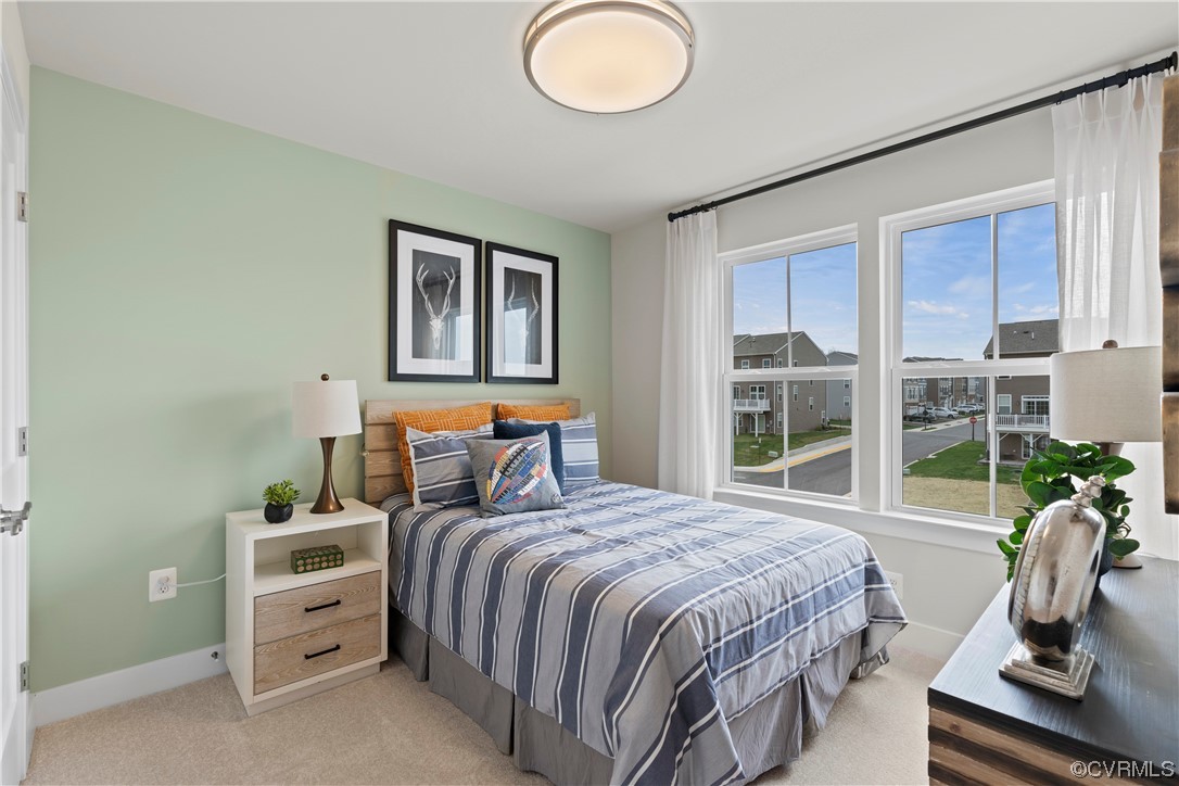 584 Rivanna Hill Road Glen Allen, VA 23060 - Photo 22 of 33 a bed room with a bed and a window