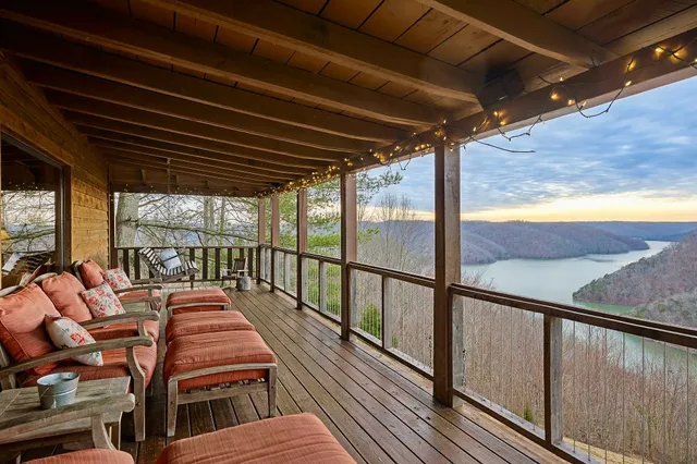 a view of balcony with wooden floor