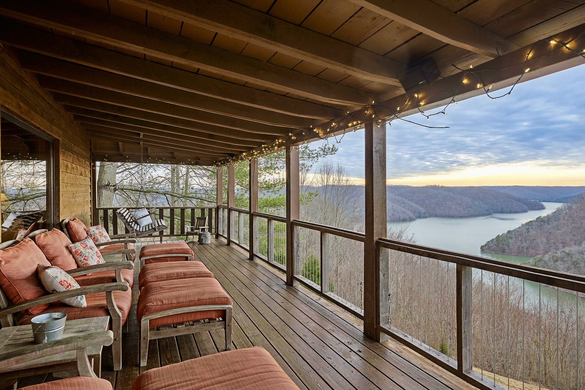 a view of balcony with wooden floor