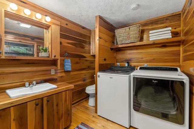 a utility room with dryer and washer