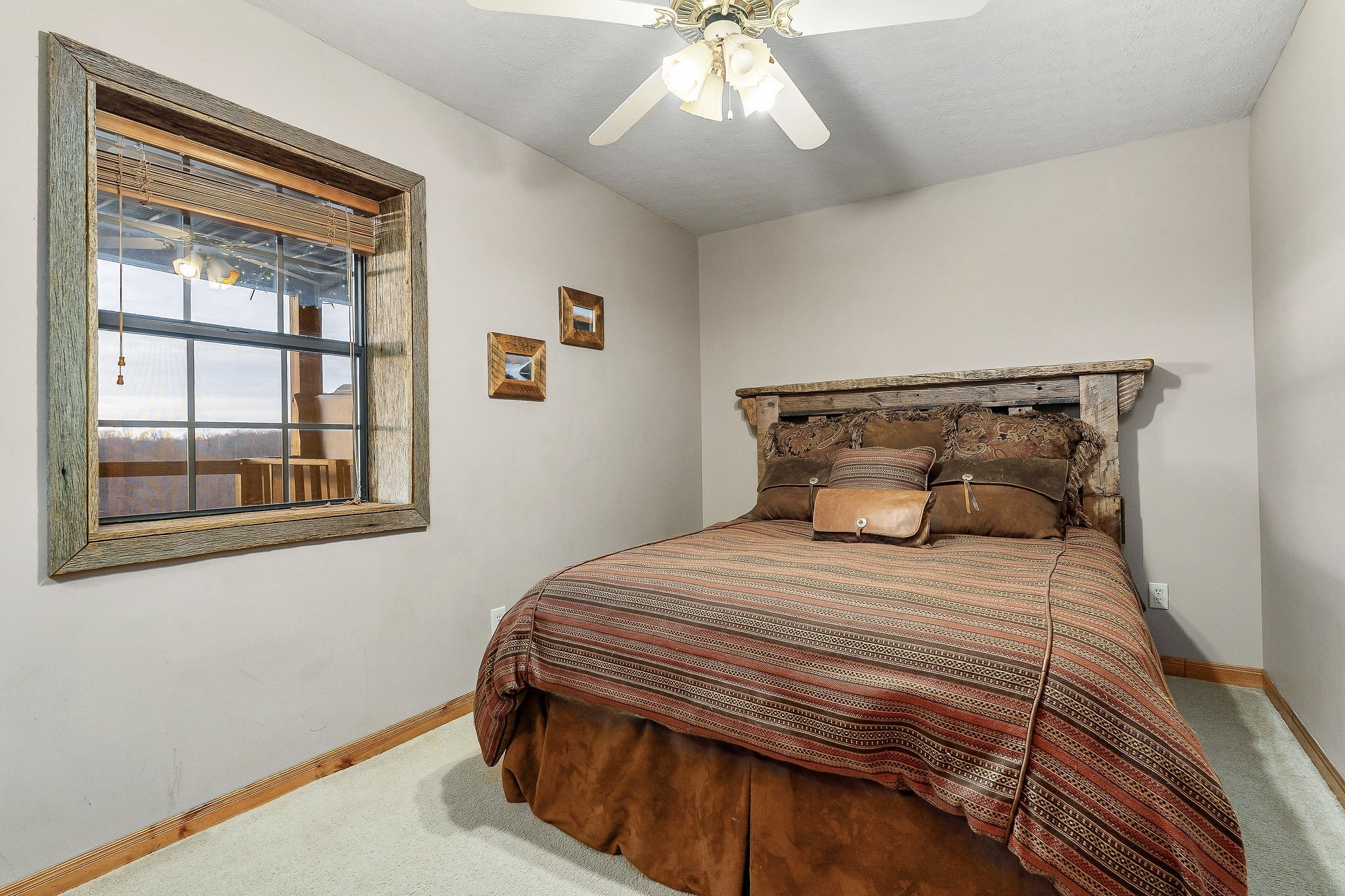 207 Dillon Road Baxter, TN 38544 - Photo 23 of 38 a bedroom with a bed and a window