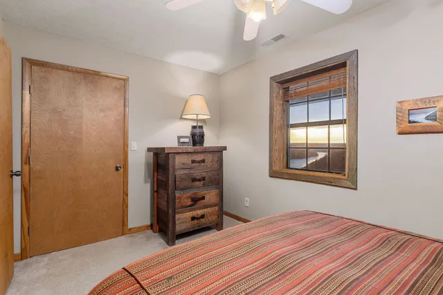 a room with bed and a window