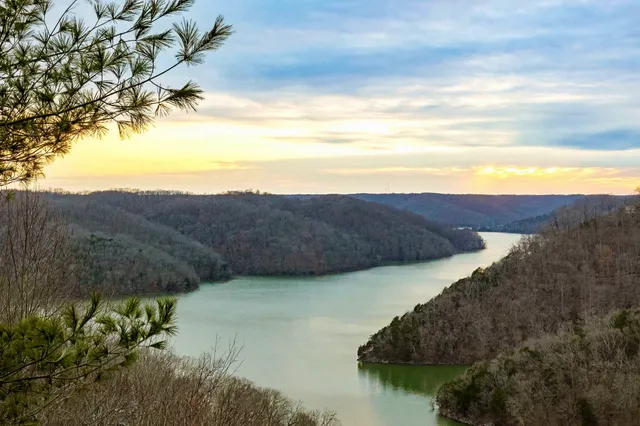 a view of a lake with mountains in the background