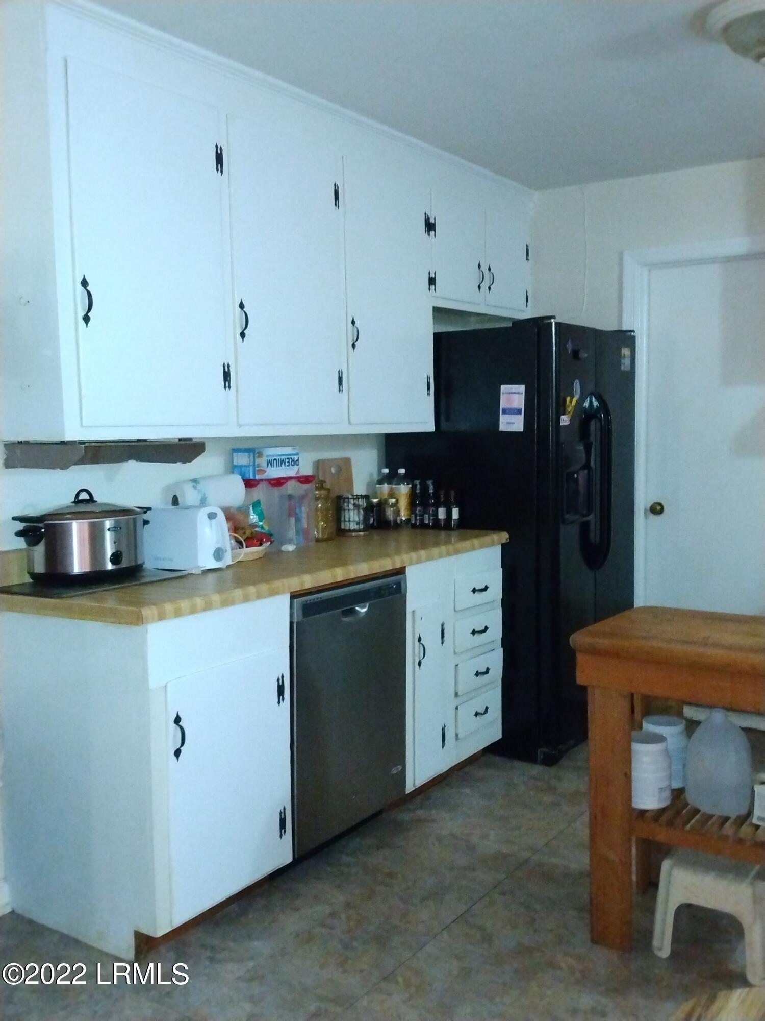 2400 State Rd S-7-386 Beaufort, SC 29902 - Photo 10 of 47 Original kitchen cabinets