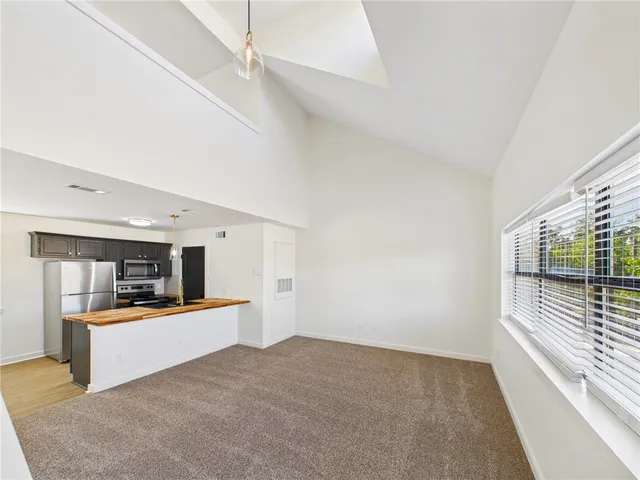 a view of a kitchen with a sink