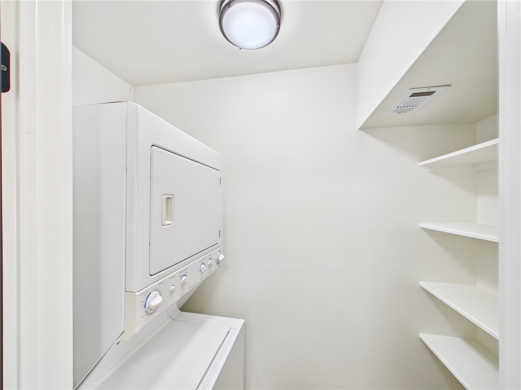 309 Mobile Avenue, Unit 6 Bryan, TX 77801 - Photo 8 of 12 Washroom with stacked washing machine and dryer