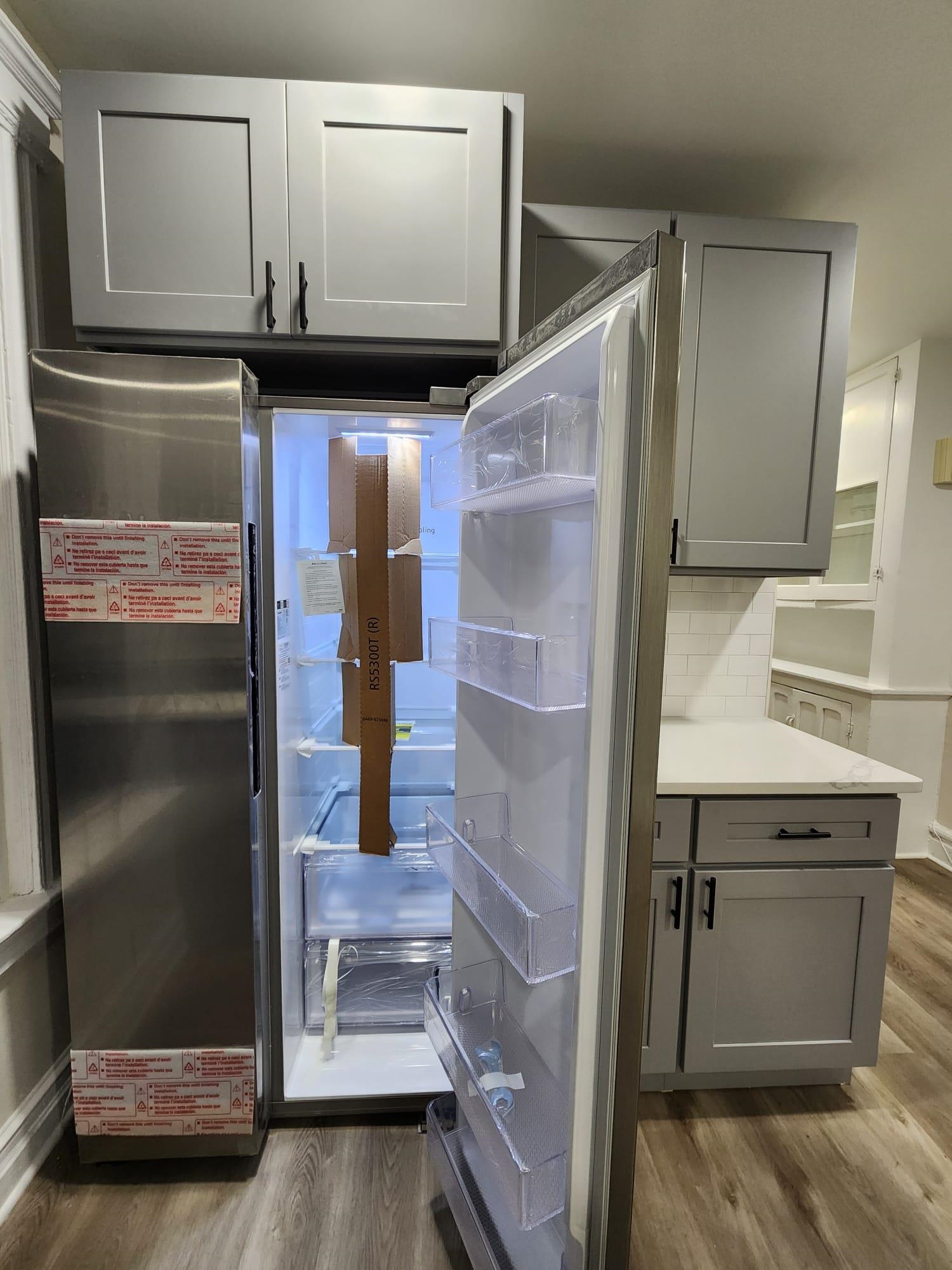 65 Halstead Street, Unit 2 Kearny, NJ 07032 - Photo 4 of 16 a kitchen with a refrigerator and a sink