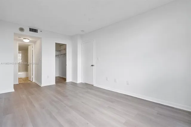 a view of a room with racks on the wall