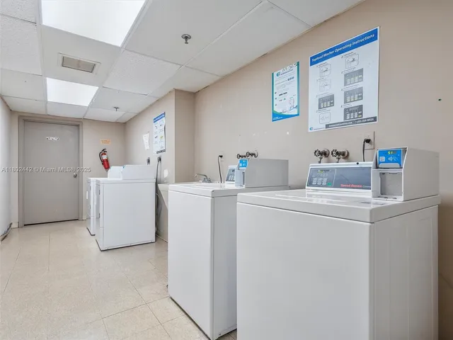 a view of a backyard and swimming pool