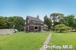 a view of a house with a big yard