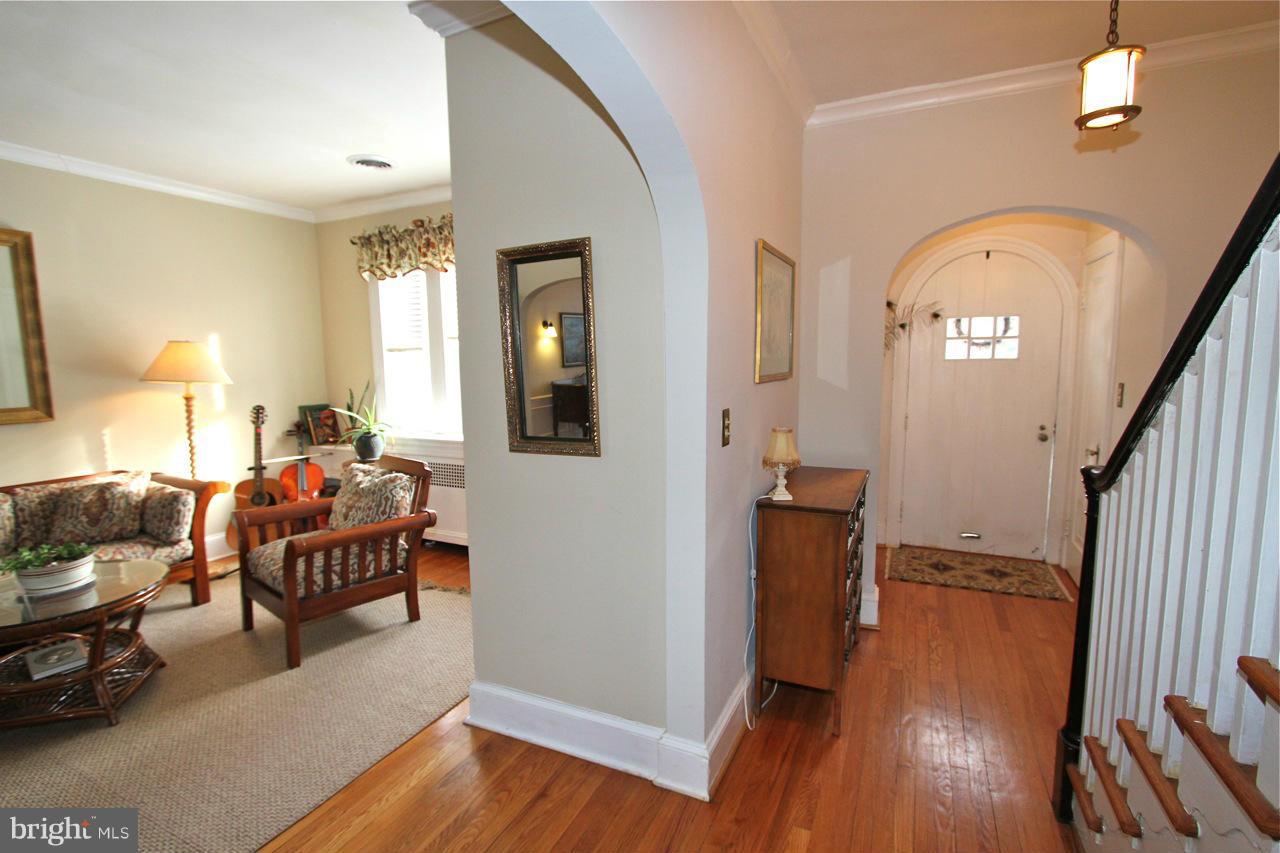 404 Hopkins Road Baltimore, MD 21212 - Photo 2 of 18 a living room with furniture and a wooden floor