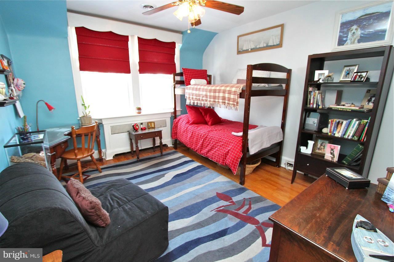 404 Hopkins Road Baltimore, MD 21212 - Photo 13 of 18 a living room with furniture rug and window