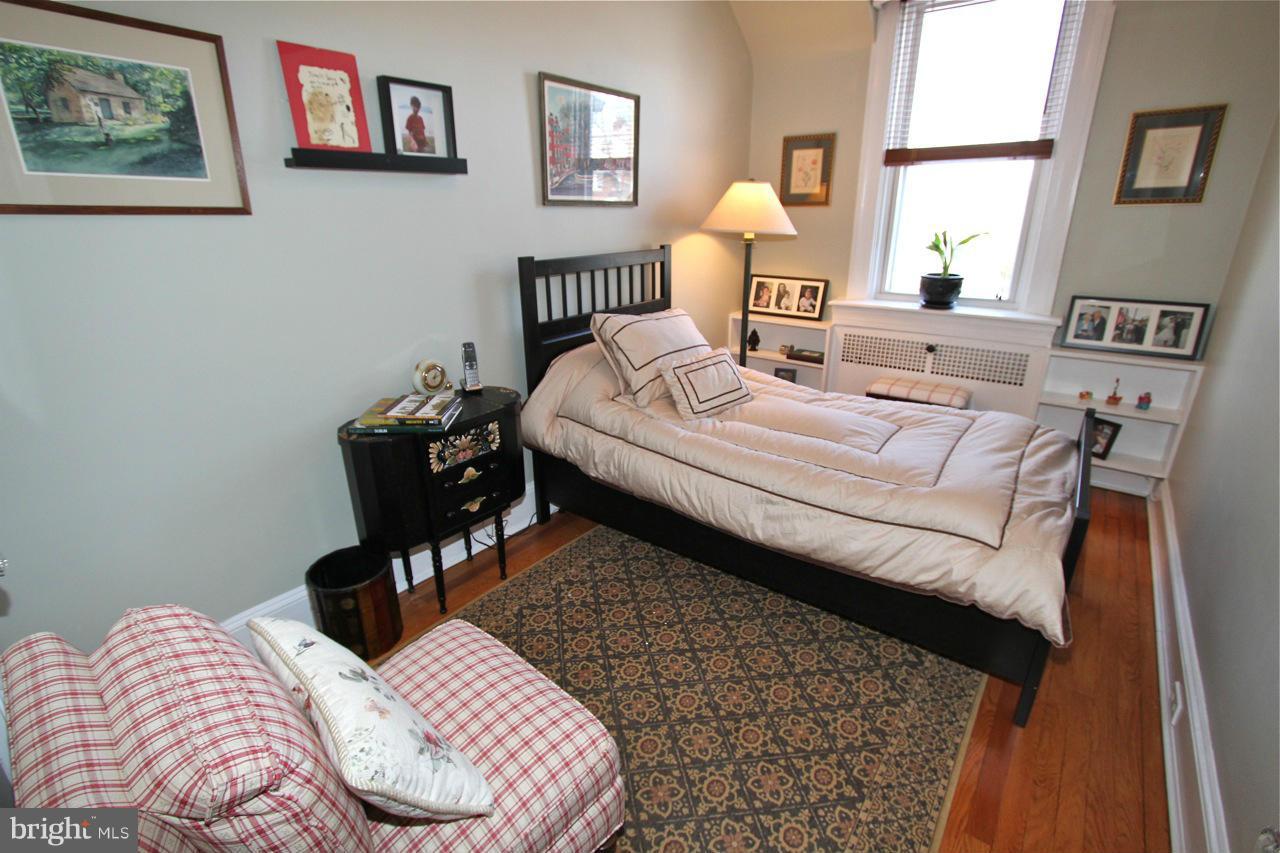 404 Hopkins Road Baltimore, MD 21212 - Photo 14 of 18 a bedroom with bed and a window