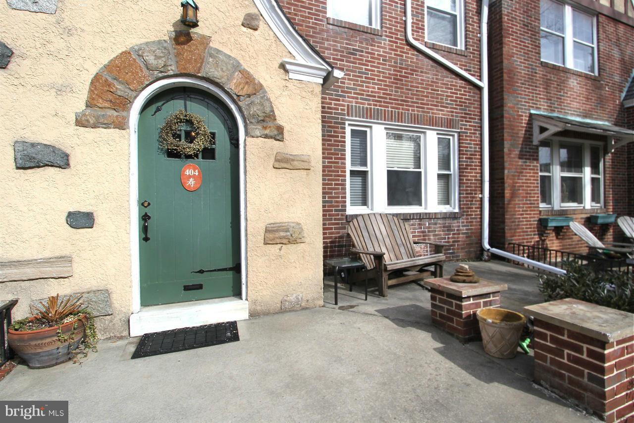 404 Hopkins Road Baltimore, MD 21212 - Photo 18 of 18 a front view of a house with outdoor seating