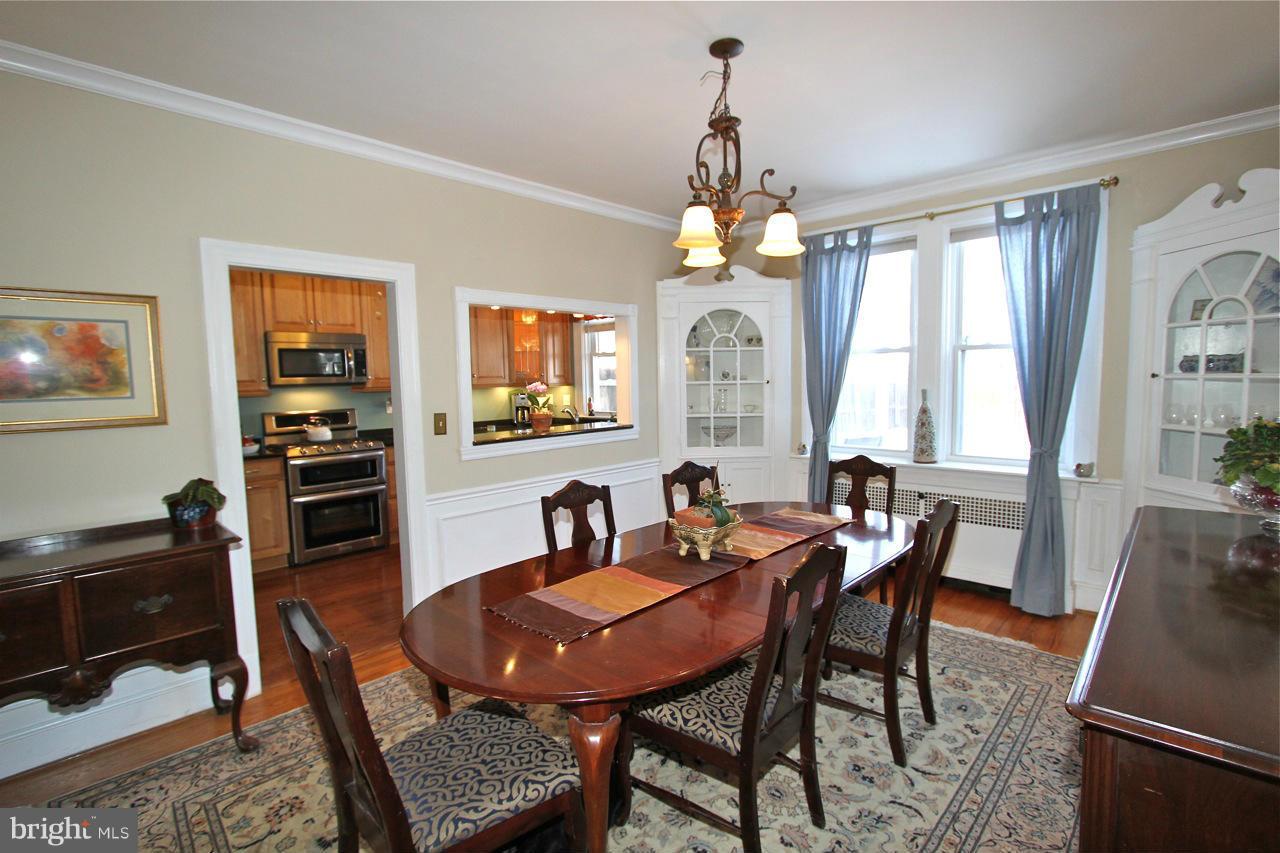404 Hopkins Road Baltimore, MD 21212 - Photo 5 of 18 a view of a dining room with furniture window and outside view
