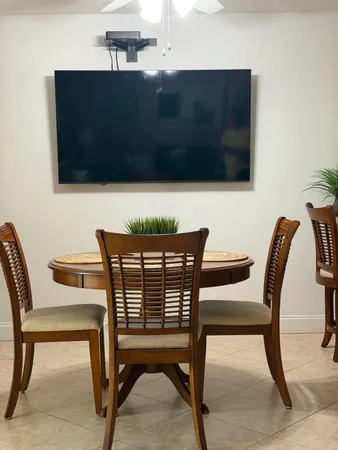 a view of a dining room with furniture