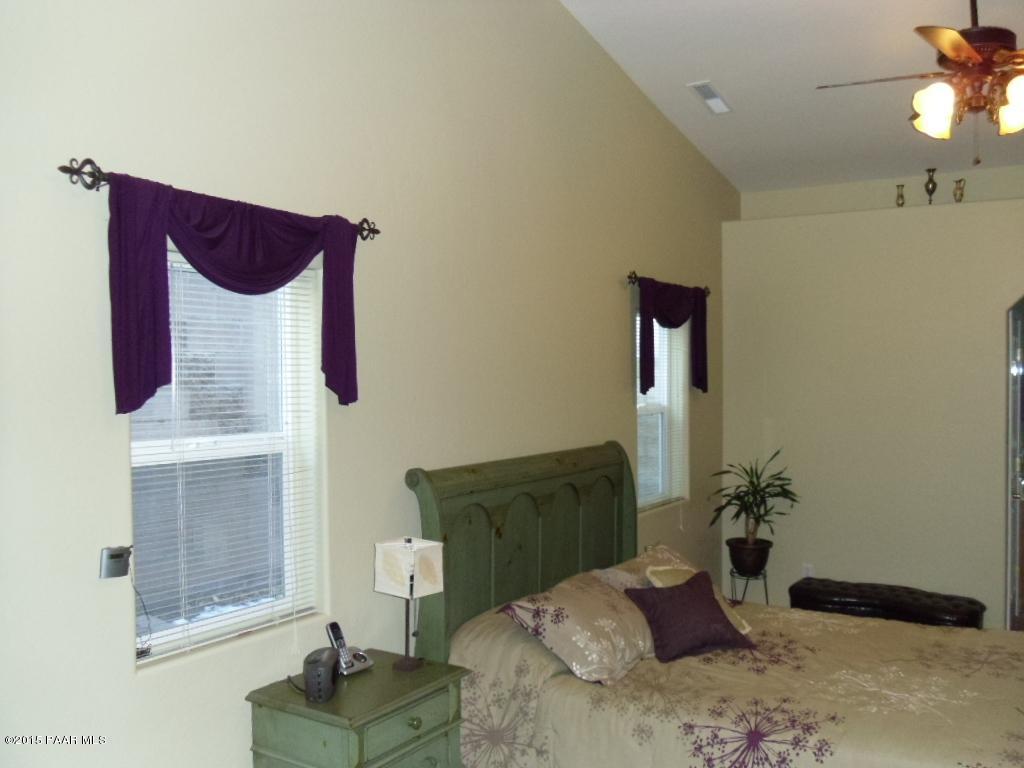 1808 Ryan Prescott, AZ 86301 - Photo 5 of 13 a bedroom with a bed dresser and mirror