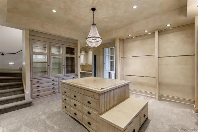 a room with pool table and windows