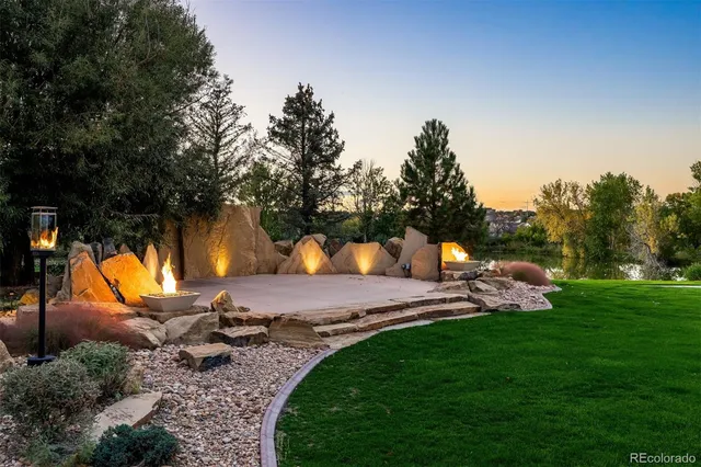 a view of a park with large trees
