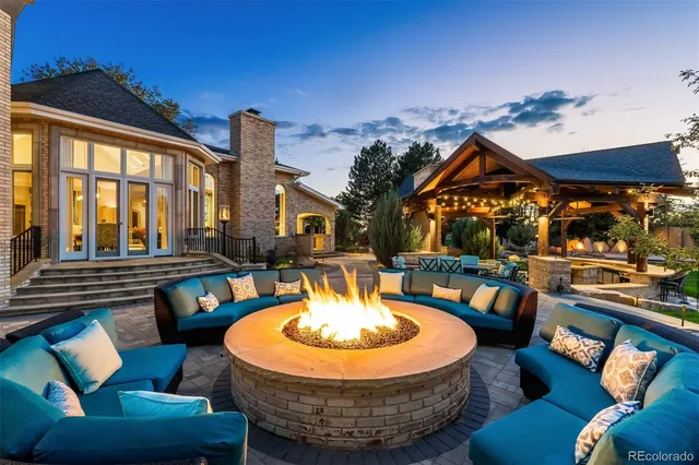 a outdoor space with patio couches and a potted plant