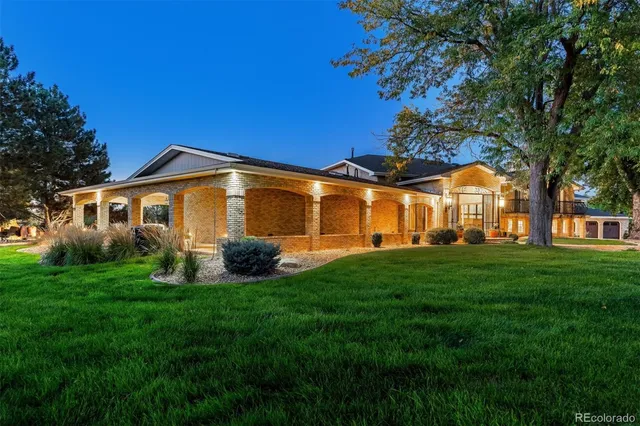 a view of a house with a big yard