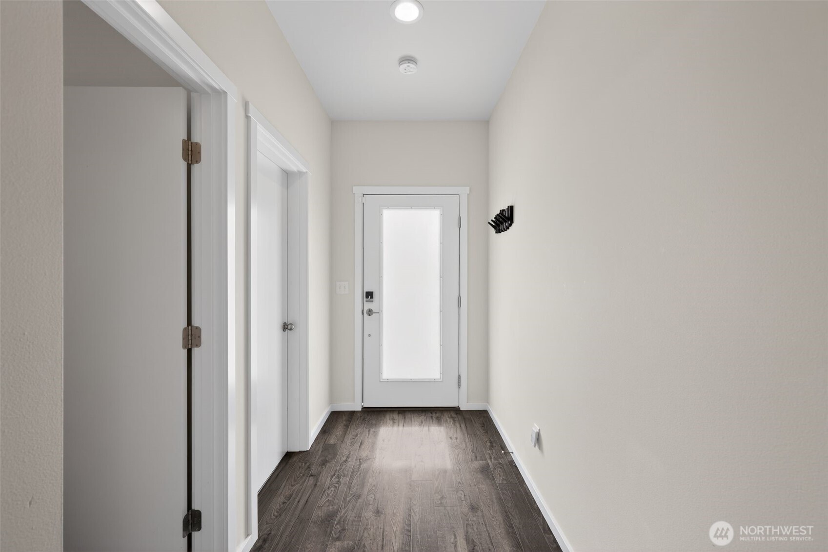 2134 Riverstone Loop Ferndale, WA 98248 - Photo 11 of 35 a view of a hallway with wooden floor