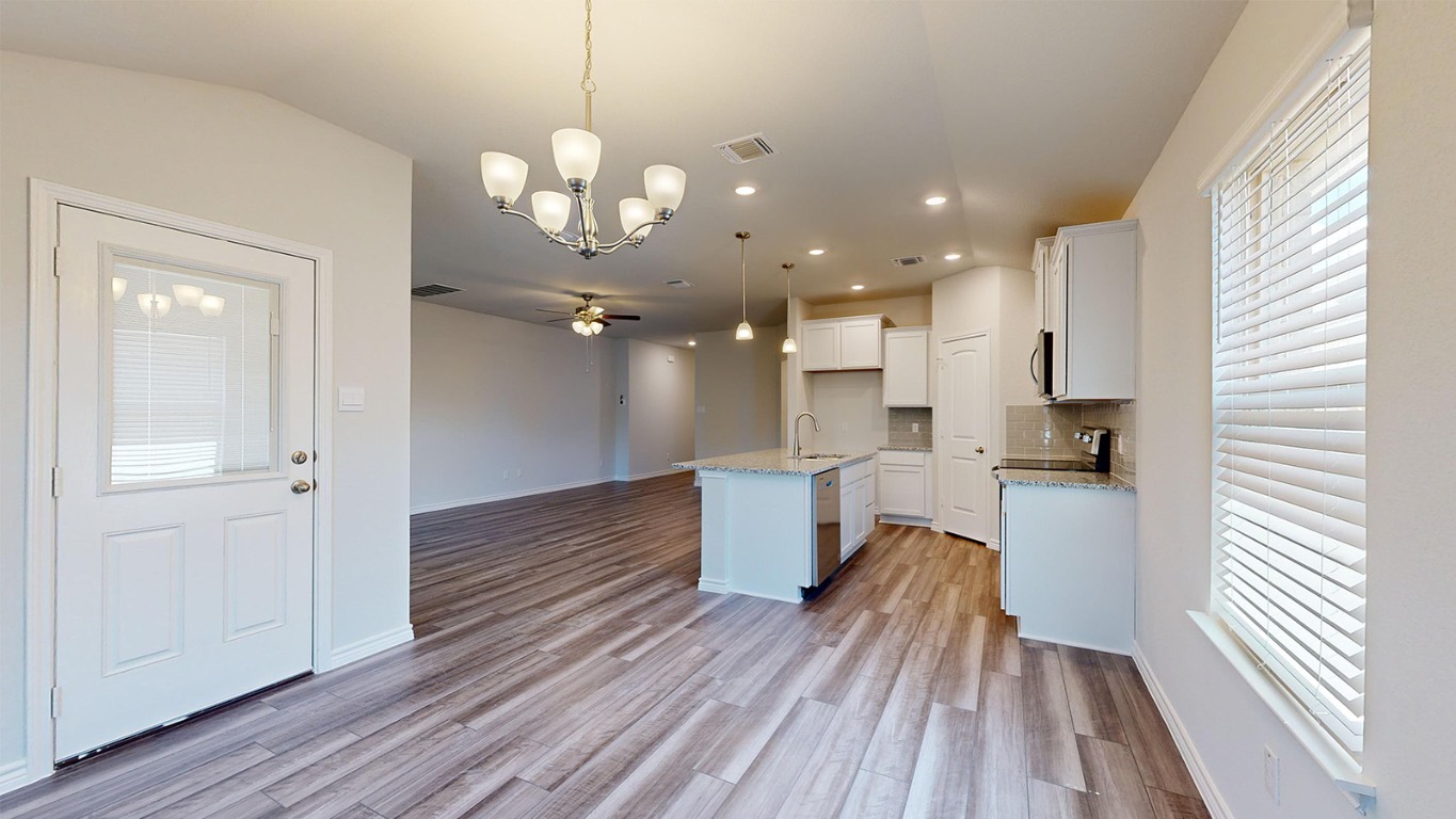 305 Creekfall Road Burnet, TX 78611 - Photo 30 of 33 a view of a kitchen and a sink
