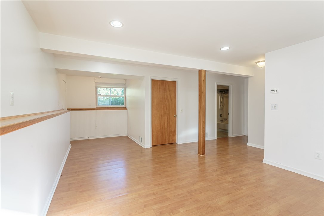 14 Prairie Trail Henrietta, NY 14586 - Photo 12 of 20 First floor living room/flex space