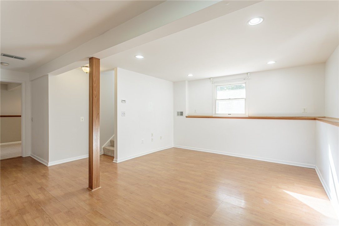 14 Prairie Trail Henrietta, NY 14586 - Photo 13 of 20 First floor living room/flex space (angle #2)