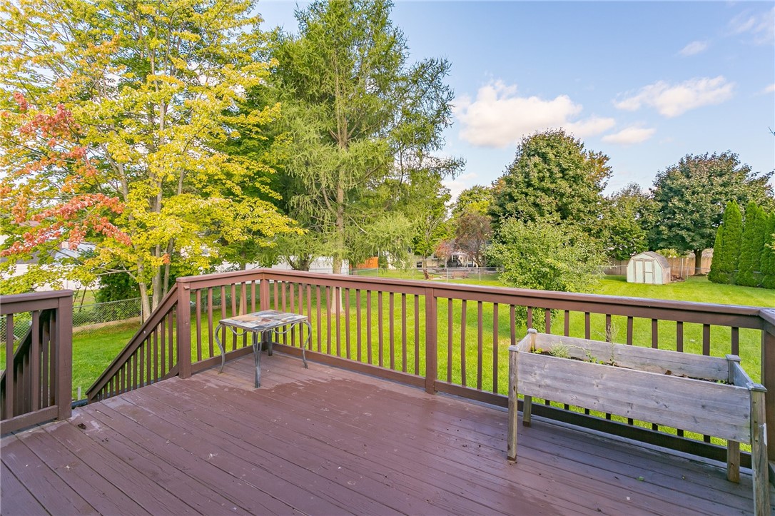 14 Prairie Trail Henrietta, NY 14586 - Photo 19 of 20 view from deck into beautiful backyard with shed