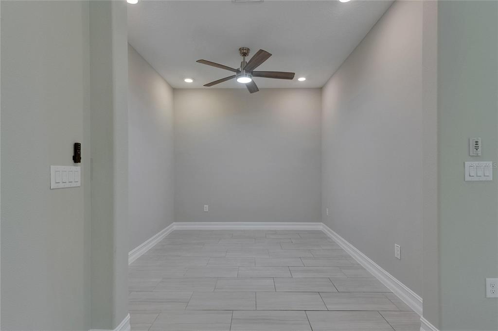 4899 Isola Court Wesley Chapel, FL 33543 - Photo 23 of 86 a view of a room with an empty space