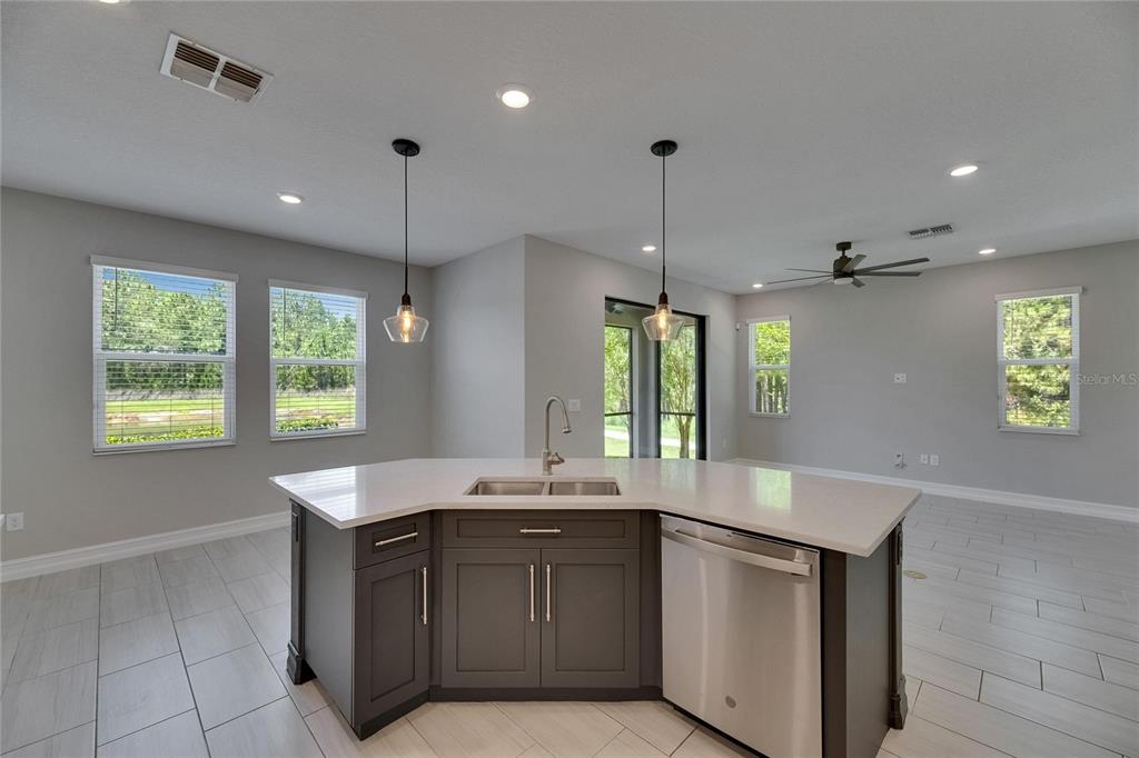 4899 Isola Court Wesley Chapel, FL 33543 - Photo 33 of 86 a kitchen with a sink and a window