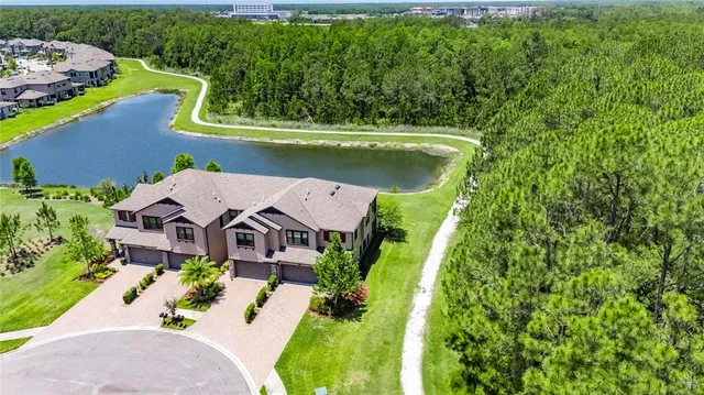an aerial view of a house with a garden