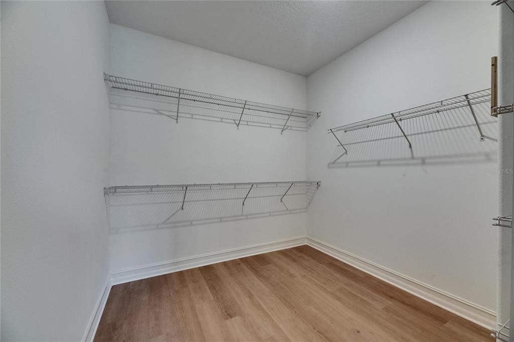 4899 Isola Court Wesley Chapel, FL 33543 - Photo 60 of 86 a view of a room with empty racks