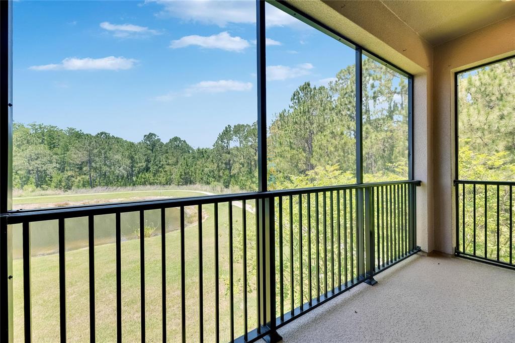 4899 Isola Court Wesley Chapel, FL 33543 - Photo 63 of 86 a view of a city street from a balcony