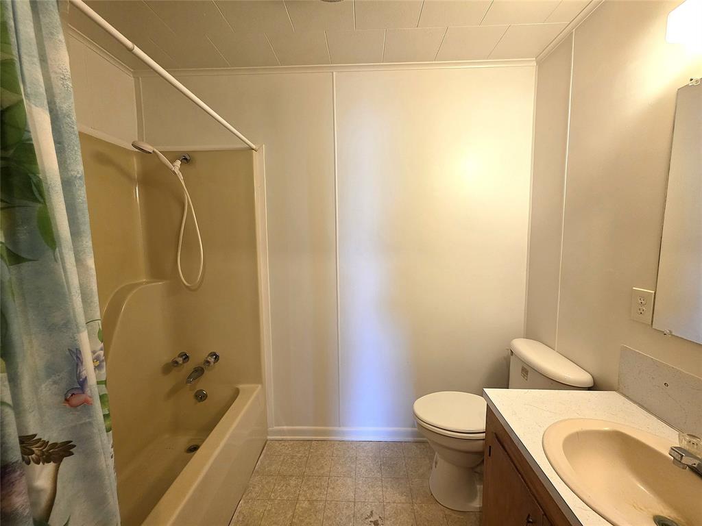 3049 Highway 507 Coushatta, LA 71019 - Photo 16 of 39 a bathroom with a sink a toilet and shower