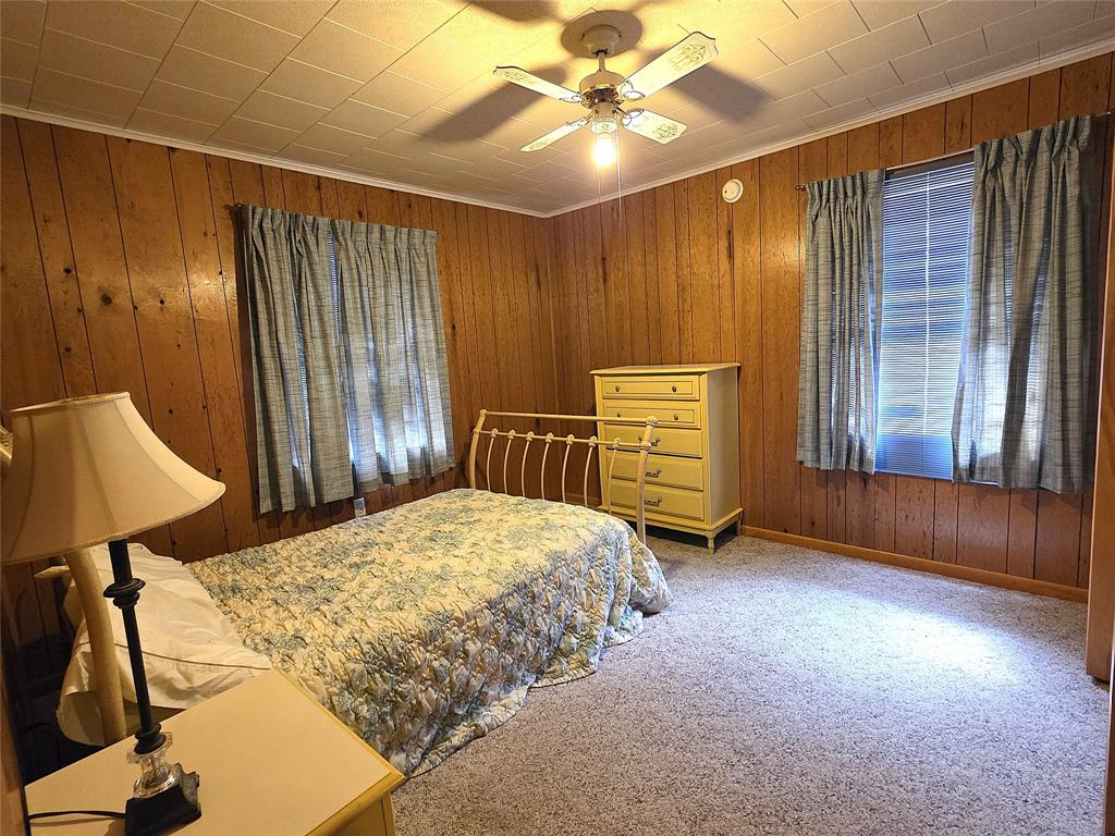 3049 Highway 507 Coushatta, LA 71019 - Photo 18 of 39 a bedroom with a bed and a dresser
