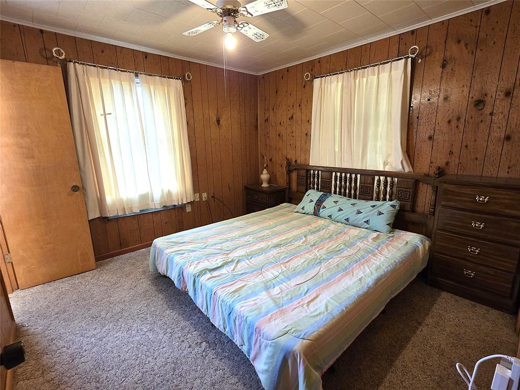 3049 Highway 507 Coushatta, LA 71019 - Photo 19 of 39 a bedroom with a bed and window