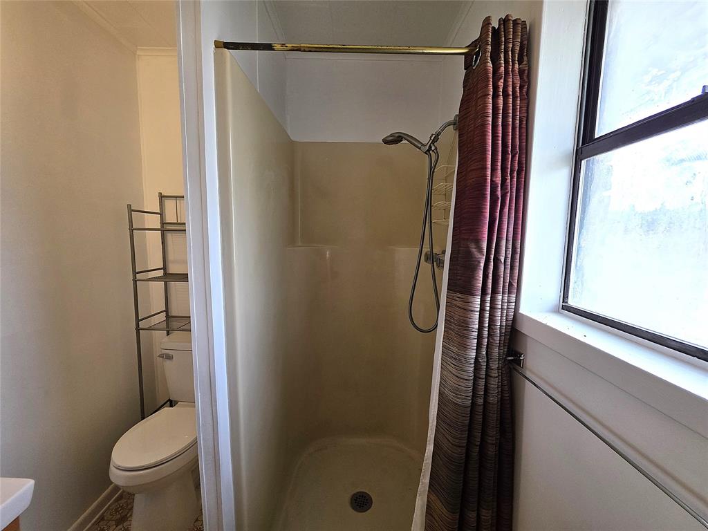 3049 Highway 507 Coushatta, LA 71019 - Photo 22 of 39 a bathroom with a shower and a toilet