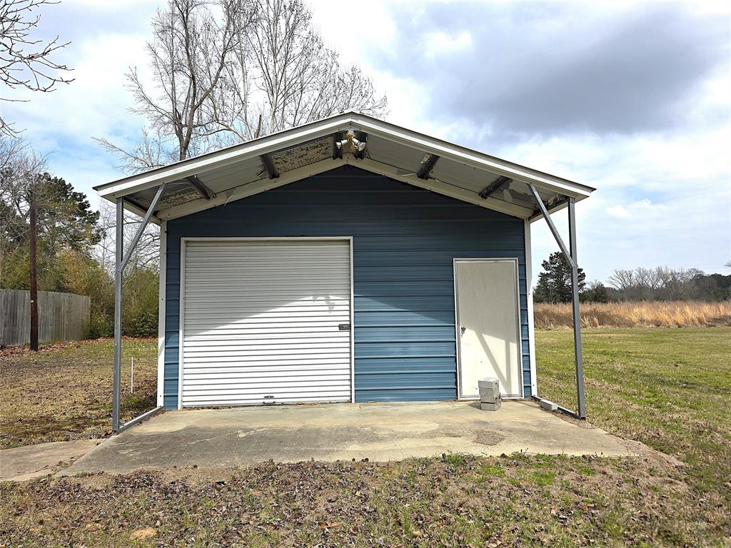 3049 Highway 507 Coushatta, LA 71019 - Photo 30 of 39 a front view of a house with a yard