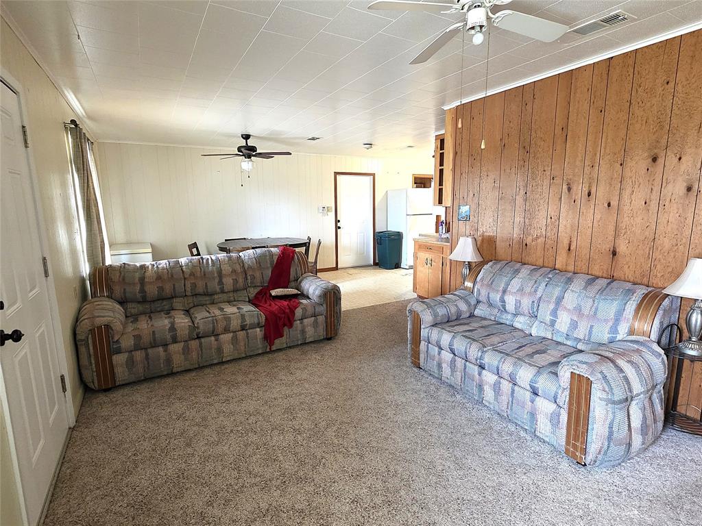 3049 Highway 507 Coushatta, LA 71019 - Photo 8 of 39 a living room with furniture and a ceiling fan