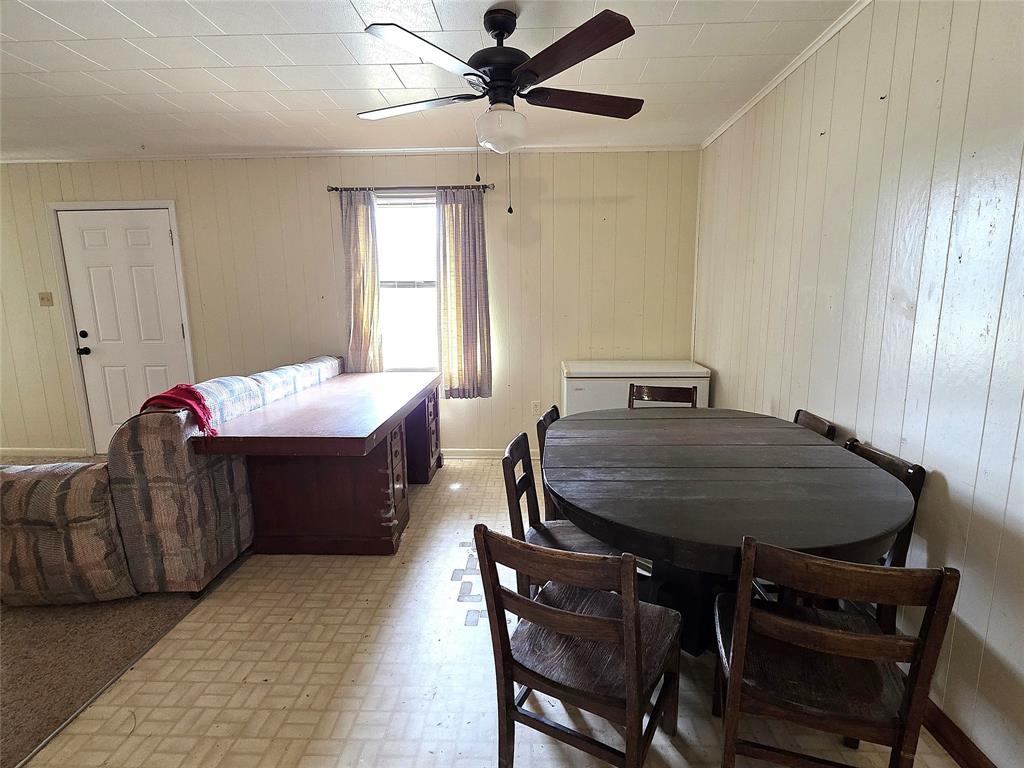 3049 Highway 507 Coushatta, LA 71019 - Photo 10 of 39 a bedroom with a bed and a chandelier
