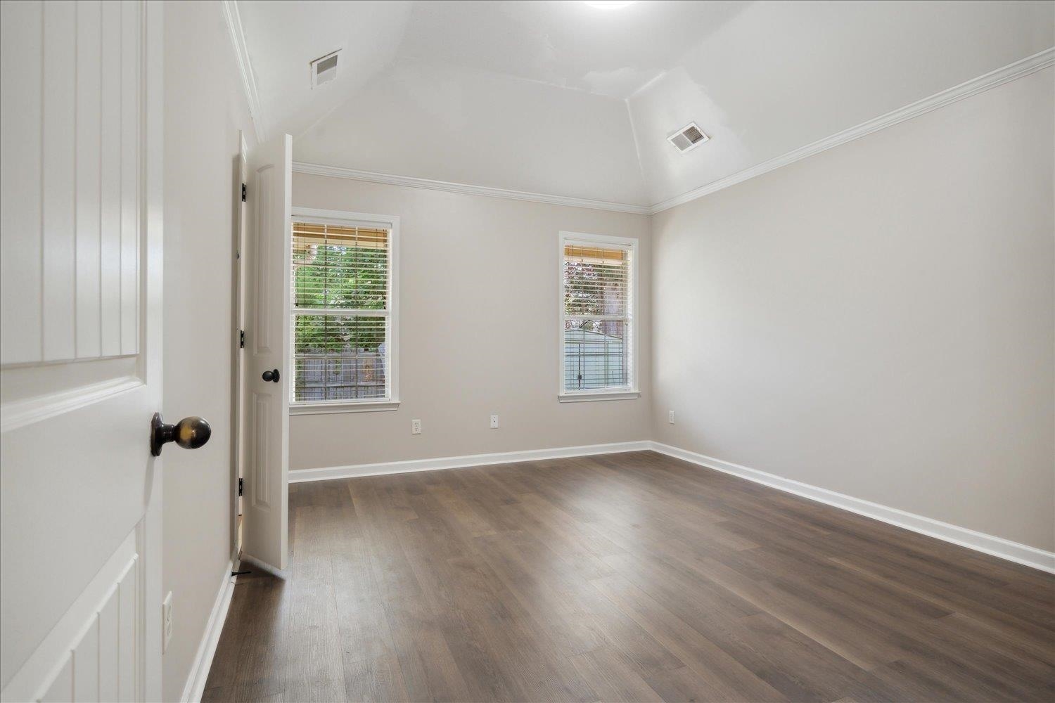 6948 Wynne Ridge Road North Cordova, TN 38016 - Photo 7 of 13 an empty room with wooden floor and windows