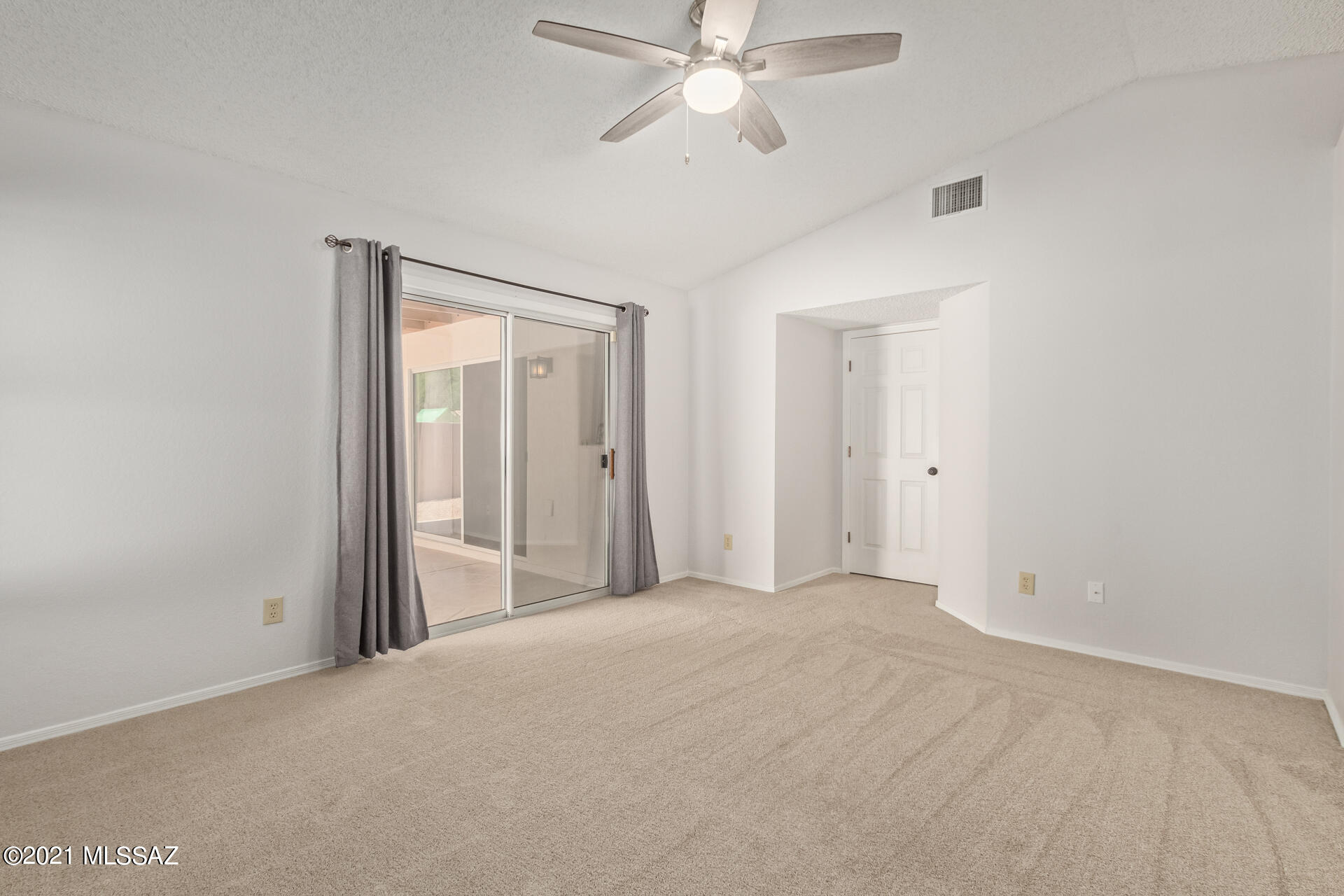 3034 West Sky Ranch Trail Tucson, AZ 85742 - Photo 15 of 27 a view of a room with a ceiling fan